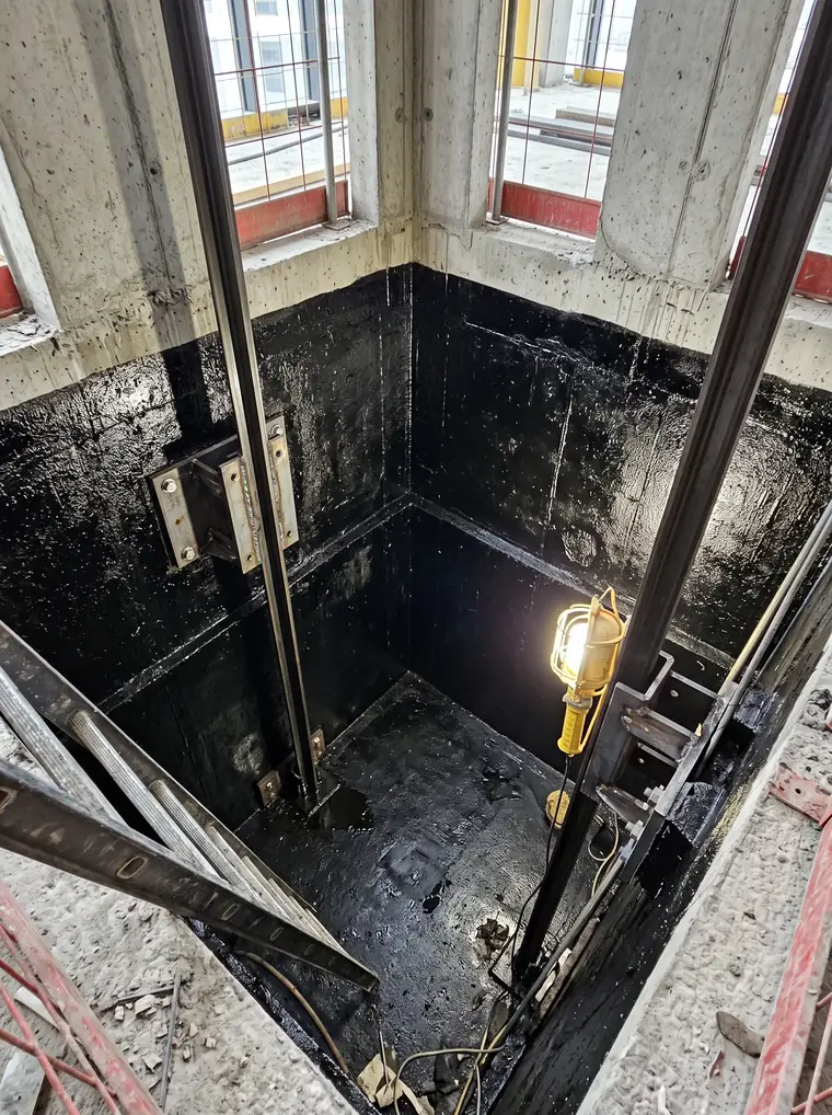 Lift pit with waterproofing detail at the corners